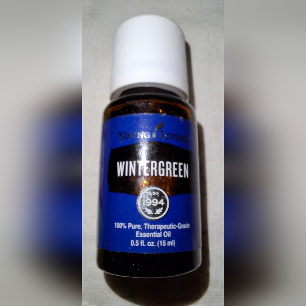 Young Living Wintergreen Essential Oil in Blue and White